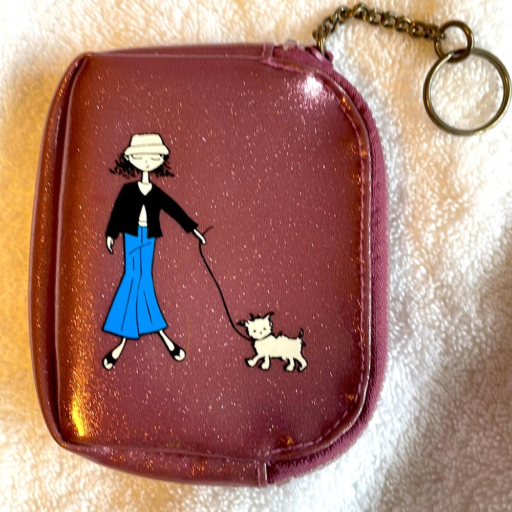 Key chain zippered with pouch. Pink. Very gently used.